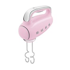 a pink electric hand mixer on a white background