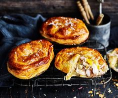 three pastries sitting on top of a cooling rack