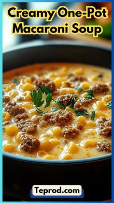 a bowl of creamy one pot macaroni soup with meatballs and parsley