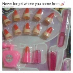 there is a pink and white plastic set with orange and white striped cones on it