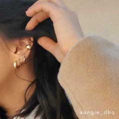 *Buy 2 items, Get 15% OFF your order. Coupon applied at checkout.* Create an effortless look with our small dome hoop earrings. The perfect everyday lightweight hoop to add style to your outfits. These small chunky hoops come in high quality 18k gold plated brass. - Hypoallergenic - Diameter: 15.5 mm. - Thickness: 6 mm. - Made in 18k gold plated - 2 Year warranty GIFT WRAP AVAILABLE TO PURCHASE: https://www.etsy.com/listing/902780367/gift-wrap-for-gift-jewelry-pouch-jewelry?ref=shop_home_active_ Trendy Hypoallergenic Hoop Ear Cuff, Trendy Hoop Ear Cuff For Pierced Ears, Trendy Hoop Ear Cuff With Piercing, Earring Cuff, 14k Gold Hoop Earrings, Small Gold Hoop Earrings, Chunky Hoop Earrings, Gold Ear Cuff, Small Hoop Earrings