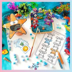 an ocean scene with sea animals, fish and other items on the table for coloring