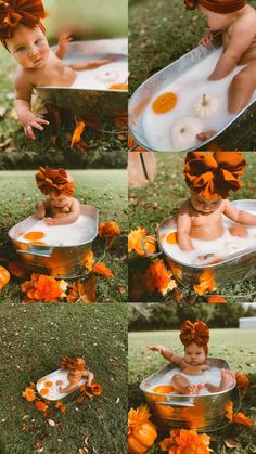 a baby sitting in a tub with orange flowers on the ground and other pictures above it