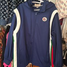 Authentic Gucci Technical Jersey Jacket, Size M. Oversized Jacket, Unisex. New Without Tags, Never Worn. Detachable Hood And The Sides Are Also Detachable As Well. Gucci Long Sleeve Track Jacket For Winter, Gucci Long Sleeve Track Jacket For Fall, Gucci Casual Winter Track Jacket, Gucci Casual Track Jacket For Winter, Gucci Spring Streetwear Outerwear, Casual Gucci Winter Track Jacket, Casual Long Sleeve Gucci Track Jacket, Blue Gucci Outerwear For Spring, Gucci Blue Outerwear For Spring