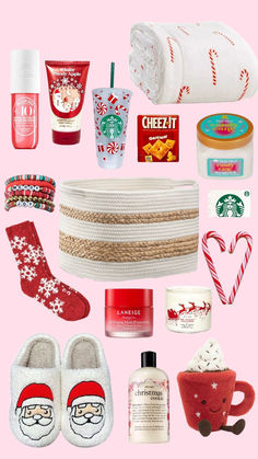 christmas items are arranged on a pink background with candy canes, coffee cup, and other holiday gifts