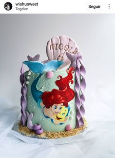 there is a cake decorated to look like ariel the mermaid