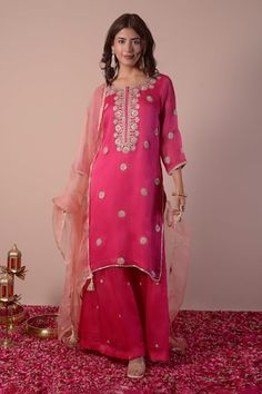 Magenta kurta featuring gota patti and zari thread embroidery. Paired with a matching sharara and a border embroidered sheer dupatta., Fit: Relaxed Pink Embroidered Mulmul Sharara, Fitted Pink Sharara With Printed Motifs, Pink Sharara With Floral Embroidery, Pink Embroidered Sharara With Straight Kurta, Pink Unstitched Floral Print Sharara, Sharara Set, Cut Work, Three Quarter, Embroidered Flowers