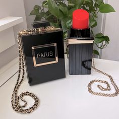 Nwt-Hard To Find Stylish, Fun, Trendy, Black & Gold Paris Perfume Shaped Shoulder Bag, Evening Bag ,Or Clutch From A Boutique . Also Black And Red Lipstick Shaped Purse With Gold Chain Strap New With No Tag. Absolutely Gorgeous Set. Smoke Free Home Formal Black Box Bag With Gold-tone Hardware, Evening Black Flap Bag With Gold-tone Hardware, Luxury Black Evening Bag With Gold-tone Hardware, Luxury Black Box Bag With Gold-tone Hardware, Paris Perfume, Black Clutch With Detachable Handle, Crossbody Shape, Evening Clutch Bag, Chain Strap, Evening Bags