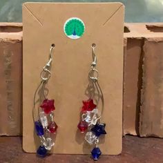 Get Ready For Warm Weather With These Absolutely Adorable Handmade Red, White And Blue Star Earrings! Perfect With Everything! Please Refer To All Photos And Feel Free To Ask Any Questions You May Have. Happy Shopping! Patriotic Red Star-shaped Earrings, Patriotic Red Star Earrings, Blue Star Earrings, Patriotic Jewelry, Patriotic Stars, Earrings Color, Blue Star, Star Earrings, Red White And Blue