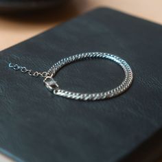 Also available in Silver, our flat cuban bracelet chain is designed to last a life time. Never worry when you wear this chain in water or at the gym, you can be sure to never have to deal with tarnishing again! #braceletsformen #mensstyle #bracelets Cuban Bracelet, Life Time, At The Gym