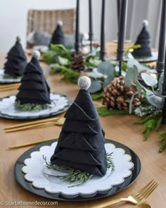 black and white christmas tablescape with pine cone trees