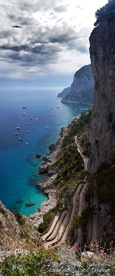 the caption for capri is in front of an image of water and mountains