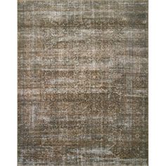 an area rug with different colors and patterns on the carpet, including brown, beige and white