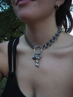 Duo Chain Chainmail Choker with a Barrel-Weave and 4in1 Chain This chainmail choker is crafted from stainless steel and adorned with various customizable charms and pendants. Silver Dangle Chain Choker, Black Stainless Steel Chainmail Jewelry, Punk Style Chain Link Jewelry With Lobster Clasp, Metal Chainmail Choker As A Gift, Metal Pendant Choker With Chain Detail, Metal Pendant Choker With Chain, Handmade Stainless Steel Choker Necklace, Handmade Stainless Steel Choker, Metal Chain Dangle Choker