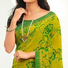 Lemon Green colored saree is prettified with beautiful floral printed work as shown which makes it appear classy. This saree is made of georgette fabric which is accompanied with georgette blouse piece which you can customise as per your design/style. Women can buy this saree to wear for their casual and daily. Note:- The actual product may differ slightly in color and design from the one illustrated in the images when compared with computer or mobile screen. Measurements: Saree : Georgette : 5. Festive Georgette Printed Saree, Festive Georgette Saree With Printed Details, Printed Georgette Saree For Festive Occasions, Green Georgette Blouse Piece With Printed Motifs, Traditional Green Chiffon Saree, Green Georgette Dupatta With Printed Border, Green Semi-stitched Floral Blouse Piece, Green Semi-stitched Floral Print Blouse Piece, Green Floral Print Saree For Navratri