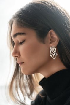 * 925 Sterling Silver Persian Calligraphy Earrings  * Inspired by a poem of the Persian well-known poet Khayyam. The text is چو هستی خوش باش which means Seize the moment. * It's a piece you will treasure. ooo SPECIFICATIONS: * Dimension: 4 * 2.5 cm (1.6 * 1 in) * Material: 925 Sterling Silver * Handmade * High-quality materials and attention to detail ooo PACKAGING:  * All orders will be wrapped in a complimentary Zargoon Signature gift box and ribbon. * Personalized Card (optional) * Orders wil Elegant Etched Dangle Jewelry, Elegant Etched Dangle Earrings, Persian Jewelry, Seize The Moment, Persian Calligraphy, Agate Earrings, Earrings Stud, Earrings Drop, Earrings Etsy