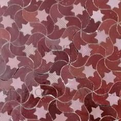 an abstract background with hearts and stars in shades of red, pink, purple and white