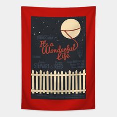 a red wall hanging with a white picket fence and the words, it's a wonderful life