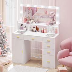 a white vanity with lights on it in a pink room next to a christmas tree