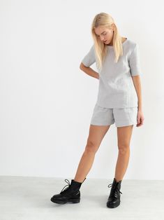 "PALMER is a short sleeve t-shirt with crew neckline and relaxed fit. DETAILS - Crew neck - Short sleeves design - Straight cut - Oeko-Tex certified 100% local washed midweight linen - Cut and sewn to order just for you in our studio COLOR - Cloudy Grey, you can also choose other colors above - Fabric samples are available here https://www.etsy.com/listing/586569696/linen-fabric-samples SIZING & FIT - Fits true to size - Length (shoulder to hem) is approximately 66 cm / 26 inches - Measurements taken from a size XS - Model is 5'10\" / 178cm and wearing a size XS CARE FOR LINEN - Machine wash up to 30ºC/86ºF gentle cycle - Lay flat to dry or tumble dry low - Warm iron if needed - Do not bleach SIZE GUIDE Size conversion guide Size XS (US 0-2, IT 36-38, UK 4-6, Japan 3-5, France 32-34) Size Linen Tee Shirt, Wide Leg Linen Trousers, Shirt Linen, Womens Blouses, Linen Tee, Linen Tshirts, Linen Shorts, Linen Top, Sustainable Clothing