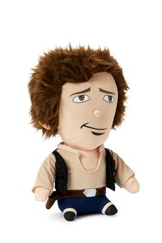 a stuffed toy that looks like the character from star wars, with brown hair and blue pants