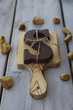 a cross made out of wood with chocolate on it