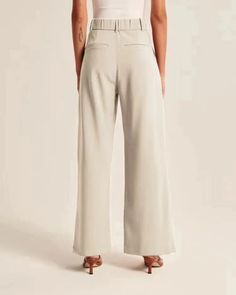 These chic wide-leg trousers are a sophisticated addition to any wardrobe, made from premium Peacock oblique fabric for a luxurious feel. Available in an array of stylish colors, including khaki, black, bronze, navy blue, and mint green, they effortlessly blend elegance and comfort. Perfect for commuting or casual outings, these trousers offer a polished look with a relaxed fit. Expertly crafted with collage and stitching details, these pants stand out for their unique design. With sizes ranging Pants Stand, Toddler Fancy Dress, Baby Christening Outfit, Toddler Winter Boots, Kids Dress Shoes, Toddler Sun Hat, Kids Winter Jackets, Baby Feeding Set, Animal Print Outfits