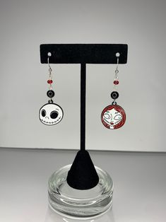 * Handmade Earrings  * Stainless steel hooks and wire with Onyx and Glass beads * Jack and Sally charms are nickel and lead free * All purchases come with a free mini gift :) Mini Gift, Jack And Sally, Handmade Earrings, Jewelry Earrings Dangle, Onyx, Dangle Drop Earrings, Glass Beads, Dangle Earrings, Etsy Accessories