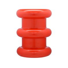 an orange plastic object is shown on a white background and it appears to be in the shape of a stack