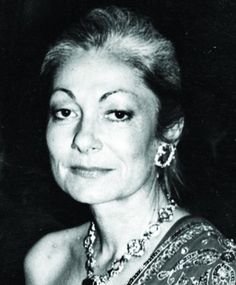 an older woman in a black and white photo