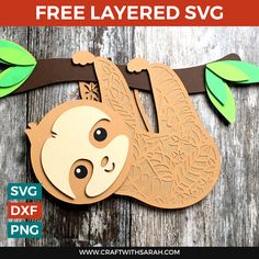 a paper slotty hanging from a tree with leaves on it's head and the words free layered svg