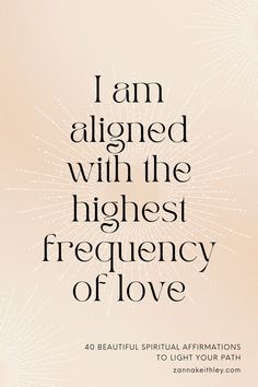 the cover of i am aligned with the highest frequency of love, written in black and white