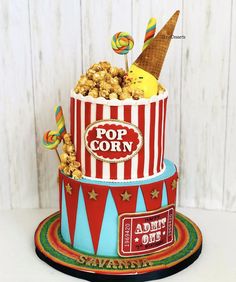 a popcorn box cake with candy and candies on top