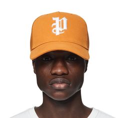 Made of cotton twill with a gothic Purple Brand monogram, this orange trucker hat is a classic paneled design with a curved visor and tonal stitching. Pre Fall 2024 White Label Front: 100% Cotton / Back: 100% Polyester Classic Trucker Hat With Curved Visor For Streetwear, Orange Trucker Hat For Streetwear, Orange Snapback Hats For Streetwear, Orange Curved Brim Baseball Cap For Streetwear, Orange Snapback Trucker Hat For Spring, Spring Orange Snapback Trucker Hat, Orange Cap For Streetwear, Orange Curved Brim Snapback Hat, Casual Orange Trucker Hat For Streetwear