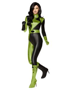 a woman in a green and black costume