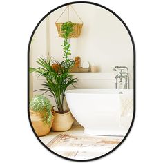 a bathroom with a tub and plants in it