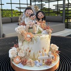 there is a wedding cake with two people on it