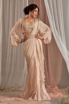 Shop for Nidhika Shekhar Pink Crepe Ruffle Pre-draped Saree With Blouse for Women Online at Aza Fashions Crepe Saree, Rose Champagne, Drape Saree, Ready To Wear Saree, Indian Wedding Wear, Balloon Sleeve Blouse, Blouse For Women, Puff Sleeve Blouse, Pink Saree