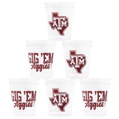 six plastic cups with the word texas in red and white on each cup are labeled big'em aggies