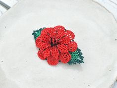 "This handmade beaded hairclip features a wild rose design featuring two tones of red against a two-tone green backing for contrast and richness. This piece is meant for everyday use and can be applied to a variety of hairstyles. It will surely add a wonderful pop of color to your hair (a place often overlooked) and it will most definitely add a special touch to virtually any outfit, formal and casual. Dimension: Length: 4\" Width: 2\" More Info: - All packages ship through Canada Post. Their se Handmade Red Hair Accessories For Gifts, Boho Hair Accessories, Native American Beaded Earrings, Hair Accessories Boho, Boho Hair, Red Rose Flower, Boho Purses, Native American Beading, Boho Leather