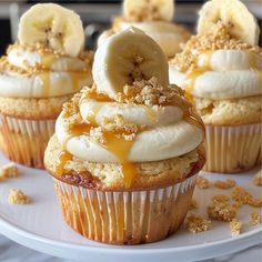 cupcakes with banana slices and crumbs on top