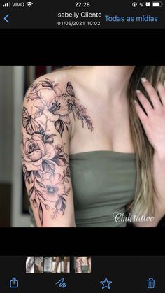 a woman's arm with flowers on it