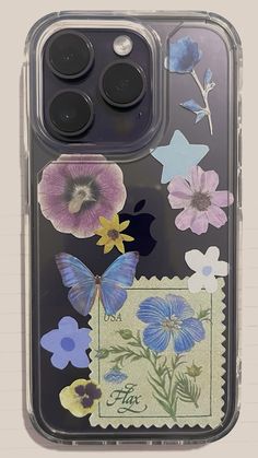 an iphone case with flowers and butterflies on it