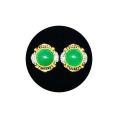 Earring Back Type: Push Back Precious Metal: 14 Karat Two-Tone Gold Gemstone: Green Jade Height: 14.85mm Width: 14.70 mm Approx. Weight: ~4.2 grams* To check availability in other sizes and designs please inquire via e-mail or Instagram DM if necessary. *All weights are approximate. Please contact us if you have further questions about alternate sizes or styles, availability, specifications, and personalization options. Luxury Jade Cabochon Earrings, Jade Earrings, Green Jade, Precious Metal, Jade Green, Earring Backs, Precious Metals, Gold Earrings, Two Tone