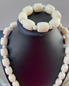 This is a traditional West African off-white beaded necklace. These jewelry pieces are unisex and are designed to be worn by adults Beads are made of resin Length ( from neck to chest): 14 inches *** Each Necklace comes with a matching bracelet These beaded jewelry is an integral part of West African culture. Traditionally it is worn by Royalty, Chiefs, and those who are part of the Royal households among many kingdoms in West Africa. It is also worn by brides and grooms during their wedding cer Classic White Jewelry With Polished Beads, Classic White Beaded Necklaces, Classic White Beaded Necklace, Classic White Beaded Necklace For Gift, Adjustable Single Strand White Beads, Adjustable White Wooden Beads, Classic White Polished Beads Necklaces, White Hand-strung Round Bead Necklaces, Classic White Polished Bead Necklaces