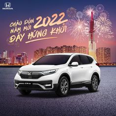 a white honda suv parked in front of fireworks