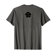 a gray t - shirt with black flowers on it