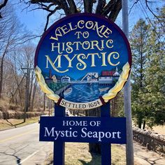 the welcome sign for mystic seaport is shown