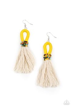 two pairs of yellow and white tasselled earrings with beads on the ends, hanging from