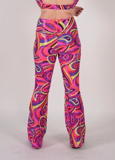 Be the raddest kitty at the festival in our most requested pants, the Groovy Bellbottoms! Made for booty-shaking, featuring a wide slimming waistband. Perfect flare while hugging every curve. Product Details 4-way stretch spandex blend Wide self stretch waistband Handmade in Brooklyn All items are made to order. Need a customization? Reach out to us HERE so we can provide you the perfect fit. Stretch Multicolor Full-length Bottoms, Trendy High Waist Bottoms For Festivals, Trendy High Waist Pants For Festival, Trendy Stretch Pants For Festivals, Fun Stretch Bottoms With Elastic Waistband, High-waisted Pants For Festival, Fun Festival Stretch Bottoms, Fun Stretch Bottoms For Festivals, Trendy Long Pants For Festivals